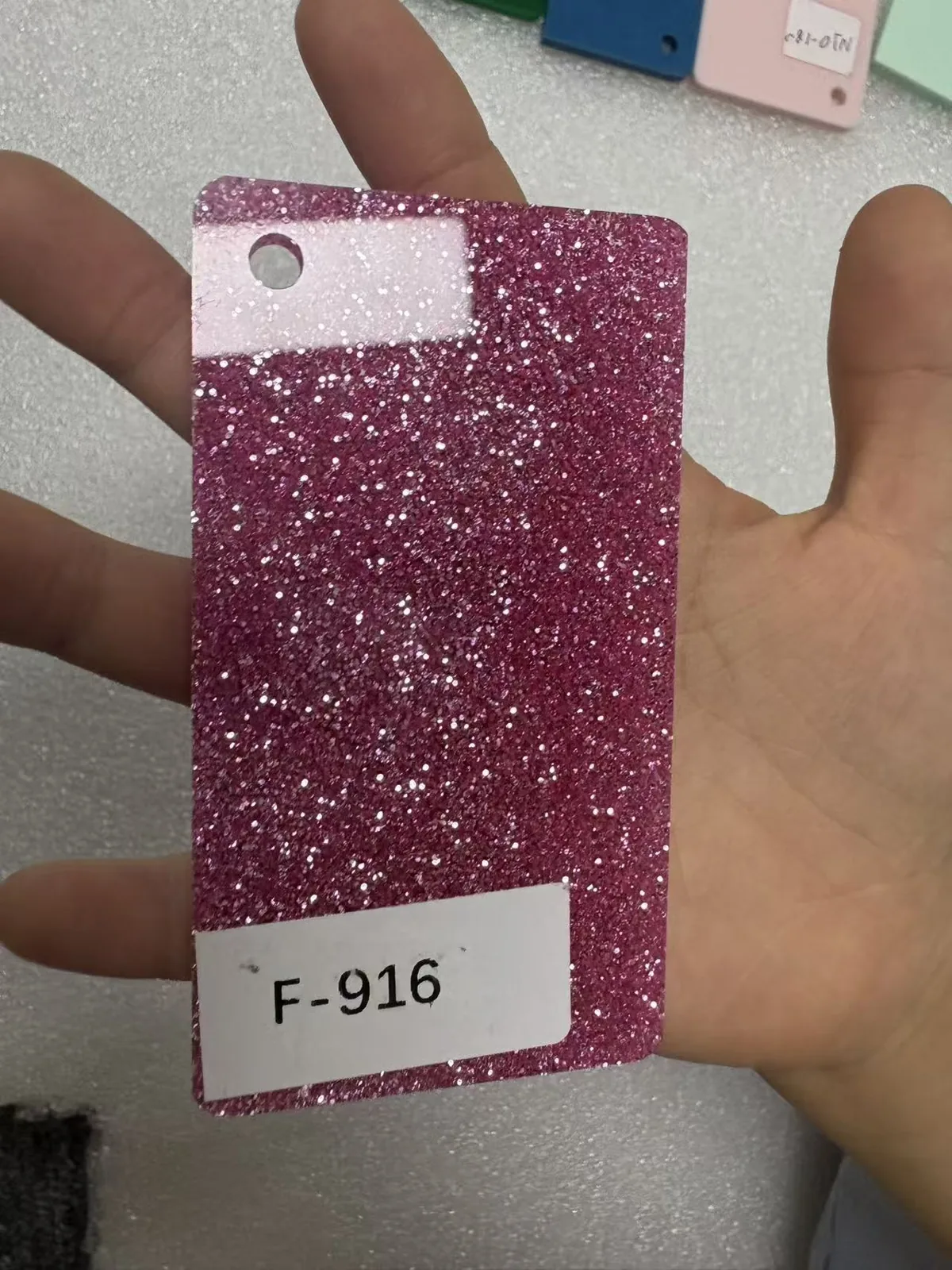 Magenta glitter acrylic swatch
