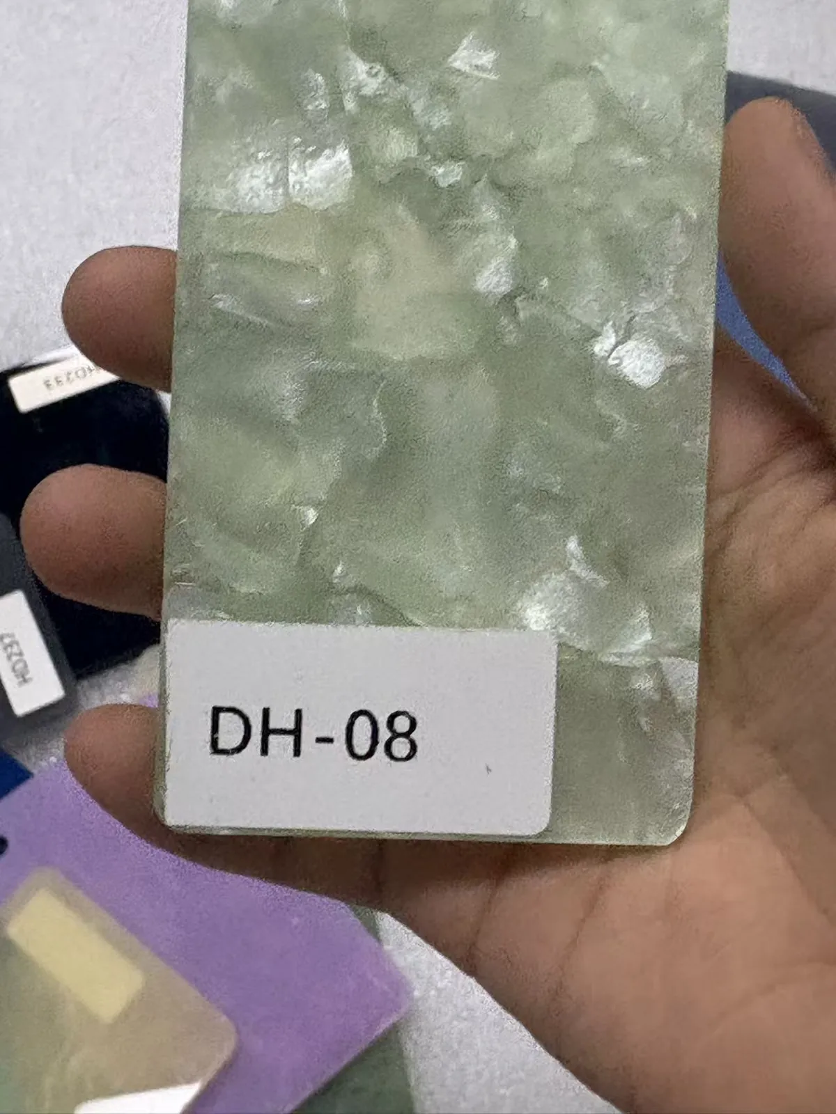 Pearl green acrylic material sample